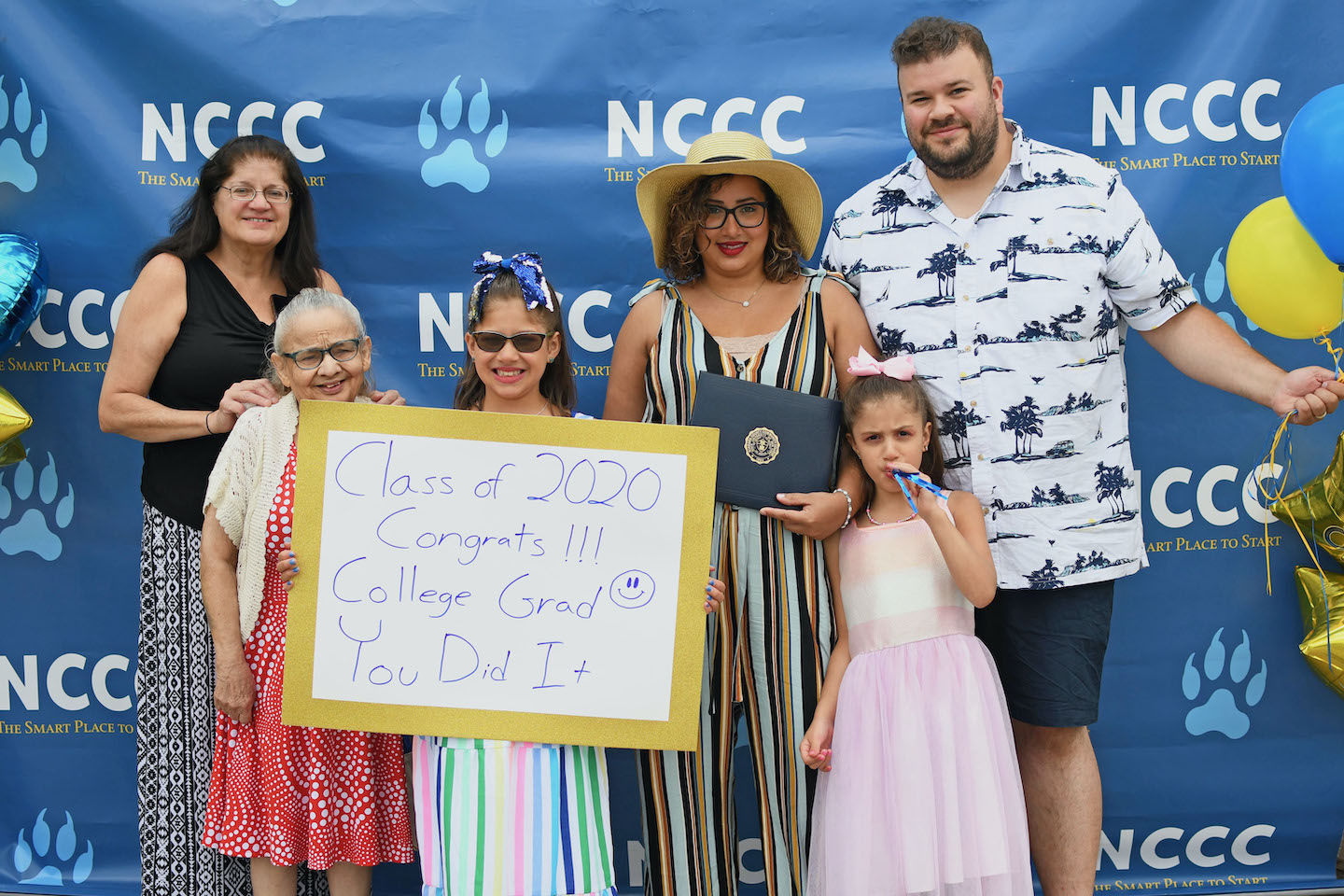NCCC graduate Maritza Rivera poses with her family during diploma pick-up on Thursday, June 25.