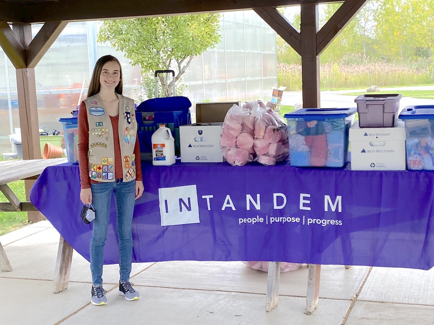 Julia Wasley displays her recent donation, which was received at Intandem's day services building at 2510 Niagara Falls Blvd. (Image courtesy of Intandem)