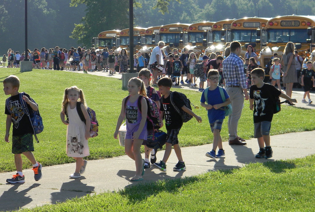 Lewiston-Porter school students embraced their first day of classes. (Photo by Terry Duffy)