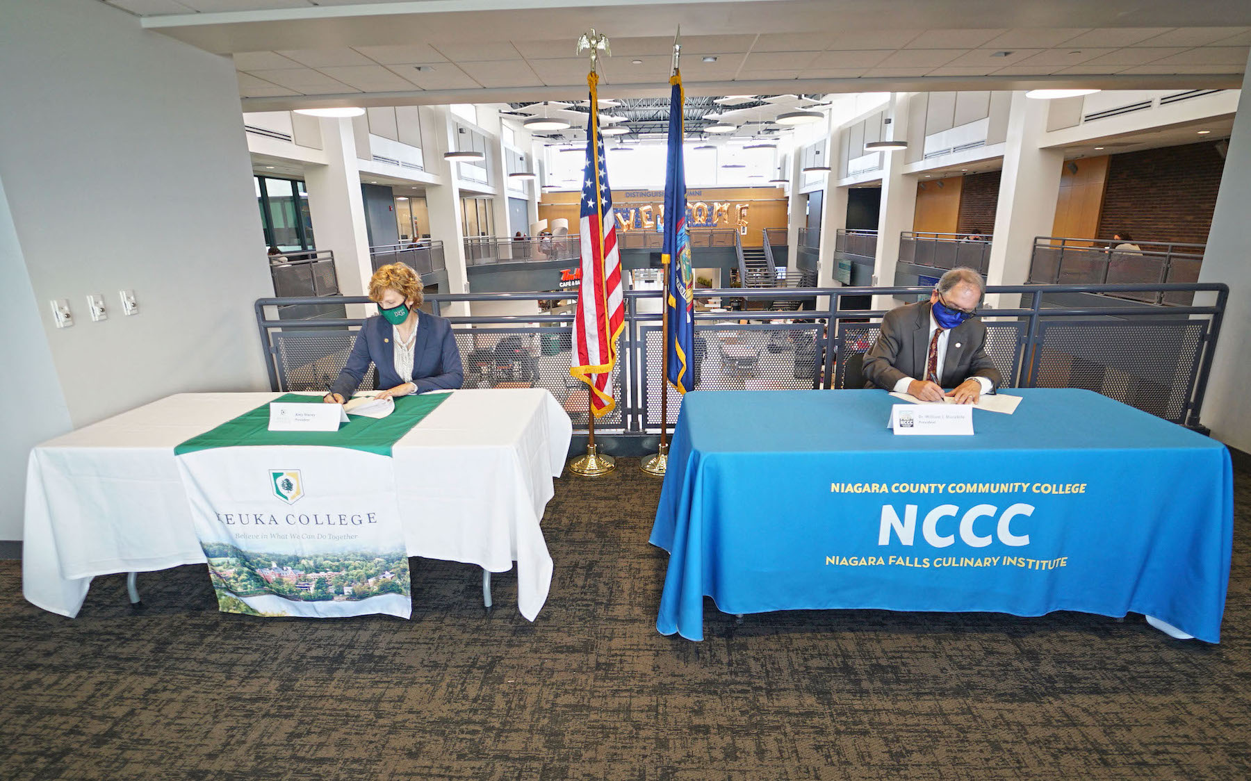 Keuka College President Amy Storey and NCCC President William J. Murabito, Ph.D. sign articulation agreements between the colleges. (Submitted photos)