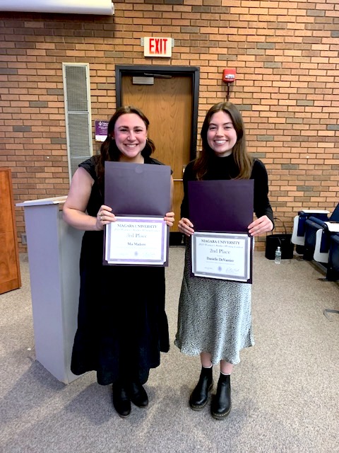 Mia Madore and Danielle DeVantier were among the three students honored during Niagara University's women's studies program writing contest award ceremony on March 9. Not pictured is first-prize honoree Arianna Musialowski.