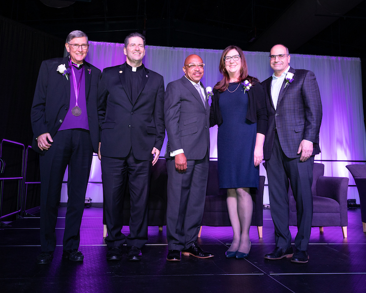 The Rev. James J. Maher, C.M., Niagara University president (second from left) with 2022 President's Dinner Honorees (from left) the Rev. Joseph G. Hubbert, Bishop Darius G. Pridgen, and OSC Charitable Foundation founders Heather and Jon M. Williams. (Niagara University photo)