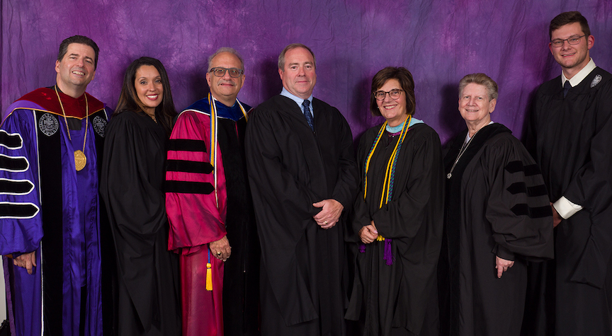 Niagara University president the Rev. James J. Maher, C.M., with Vincentian Heritage Convocation honorees Alexis Fuentes, Dr. Shawn P. Daly, David V. Whalen, Patricia Wrobel, Sister Betty Ann McNeil and Christopher Rhue.