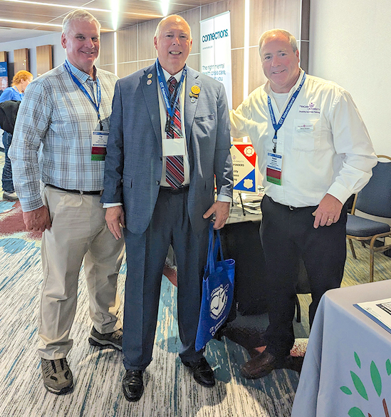 Capt. Pat Mann, NU law enforcement master trainer (left), and Dave Whalen, Niagara University's first/emergency responder disability awareness training project director and ADA coordinator (right), with Maj. Sam Cochran (ret.), co-founder of the Crisis Intervention Team. (Submitted)