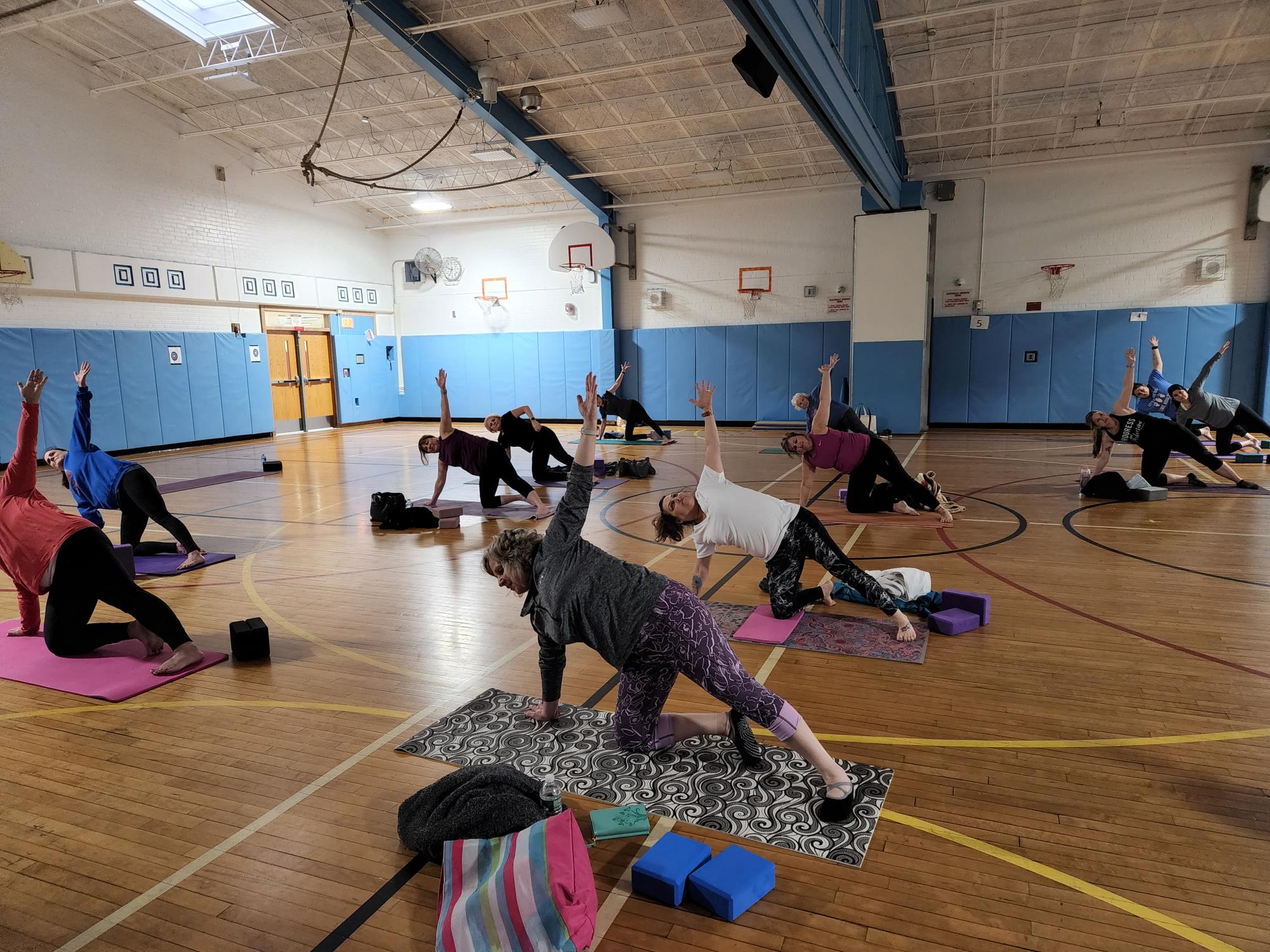 Pictured is AFAA Certified Group Fitness Certified, owner of Brave Life Yoga, RYT 200 hours, Kathy Noakes' beginning and all-level yoga classes.