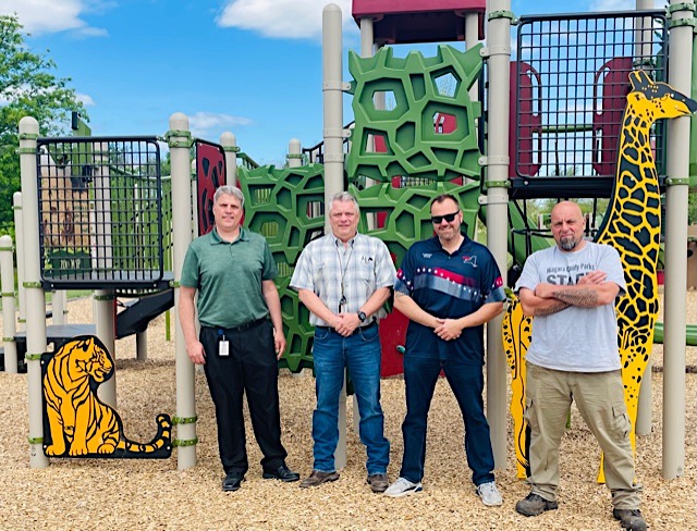 Pictured, from left, at the new Oppenheim playground are: DPW Commissioner Garret Meal, Park Director Jeff Gaston, Legislator Jesse Gooch and Parks Supervisor Frank Rotella.
