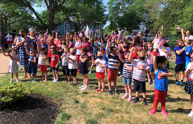 St. Peter's students salute the American flag.