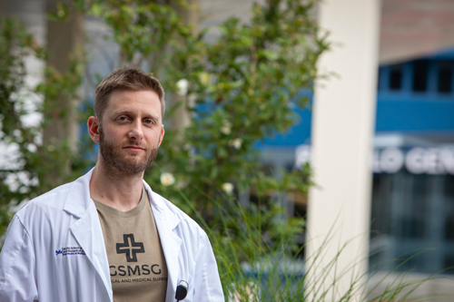 Aaron Epstein, M.D., used to work in counterterrorism and national security. Now a second-year surgical resident at UB, he leads an international medical mission group that is helping fight COVID-19 in the U.S. (Photo by Meredith Forrest Kulwicki, University at Buffalo)