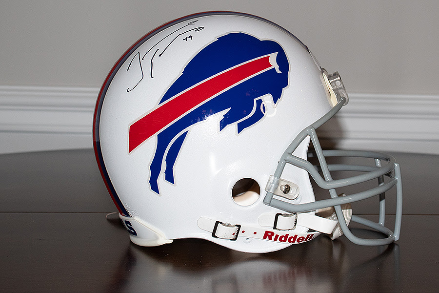 Items up for bid include a football autographed by Josh Allen, helmets signed by Jerry Hughes and Tremaine Edmunds, plus gift baskets to indulge every whim. (University at Buffalo photo)
