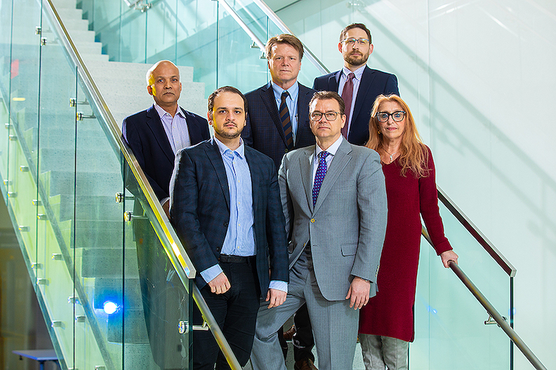 CASA MS principal investigators are (front row, from left) Dejan Jakimovski, Robert Zivadinov and Bianca Weinstock-Guttman; and (back row, from left) Murali Ramanthan, Ralph Benedict and Michael Dwyer. All are UB faculty members. (University at Buffalo photo)