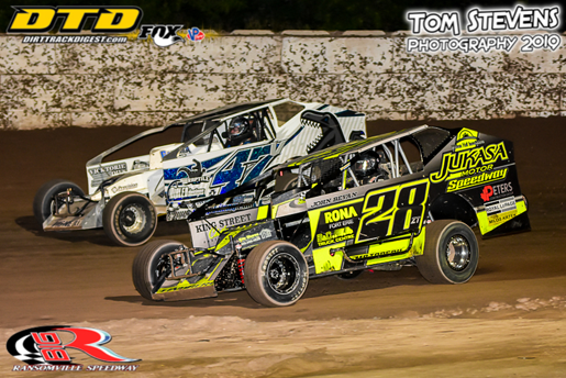 Ransomville Speedway is revving up for 2021. Gary Lindberg (28) and Phil Vigneri (47) are shown racing at the `Big R` in September 2019. (Photo by Tom Stevens)