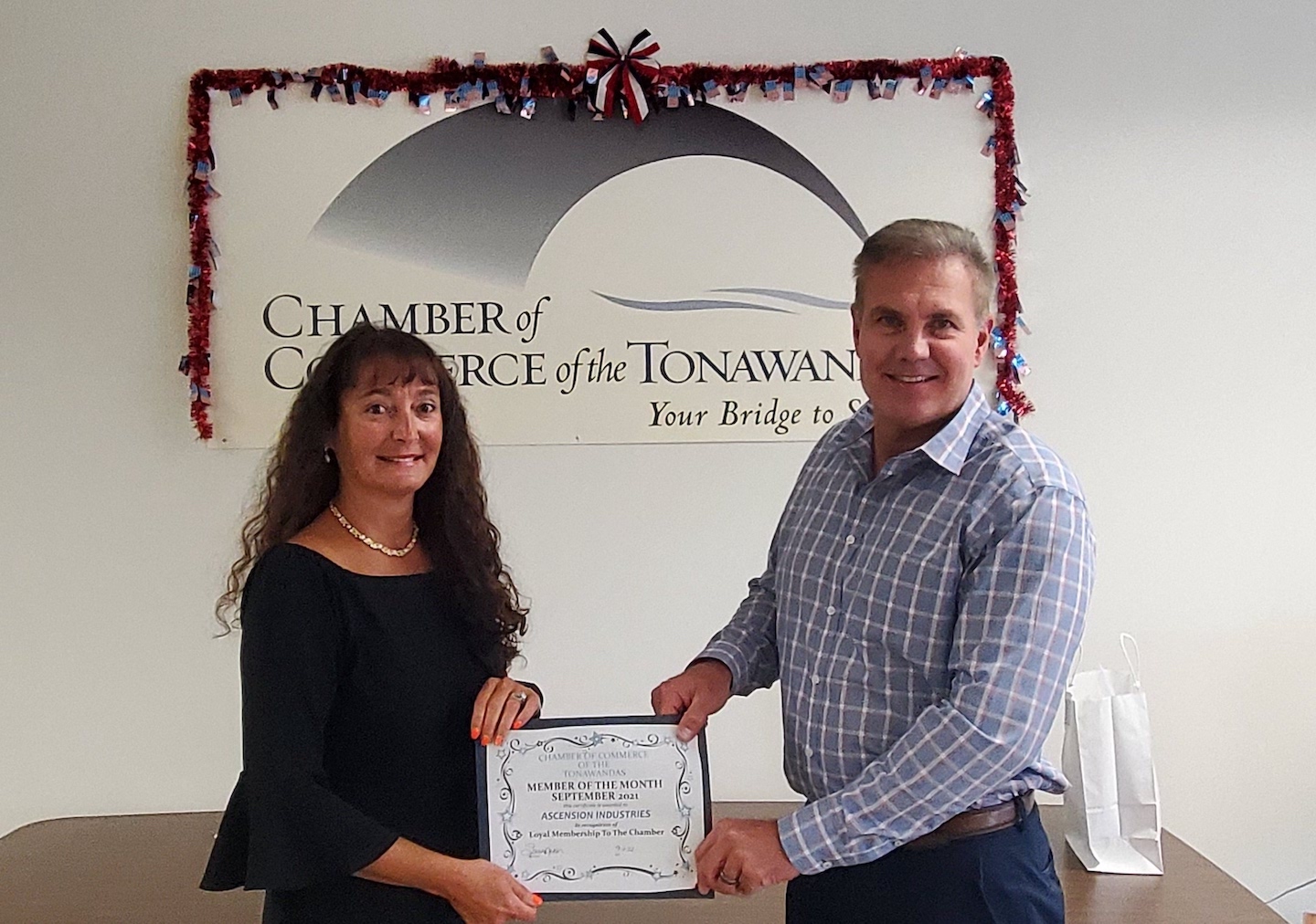 Pictured, from left: Michelle Madigan and Doug Wehrmeyer. (Photo by Sarah Nelson/Chamber of Commerce of the Tonawandas)