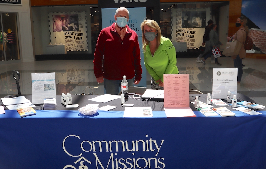 Macerich Senior Property Manager John Doran and Community Missions Events and Volunteer Manager Susan Dunlap Falbo on hand for a clothing drive during the Fashion Outlet's Earth Day event.