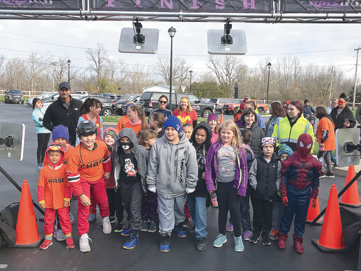 Students of all ages participated in a Kids Fun Run around the Nation House.