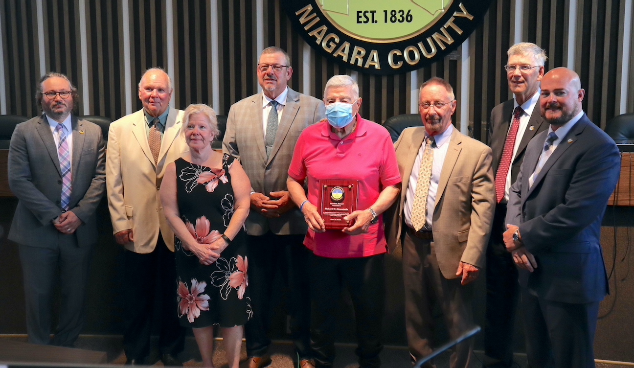 The Wheatfield Town Board honored Richard Muscatello, center, this week.