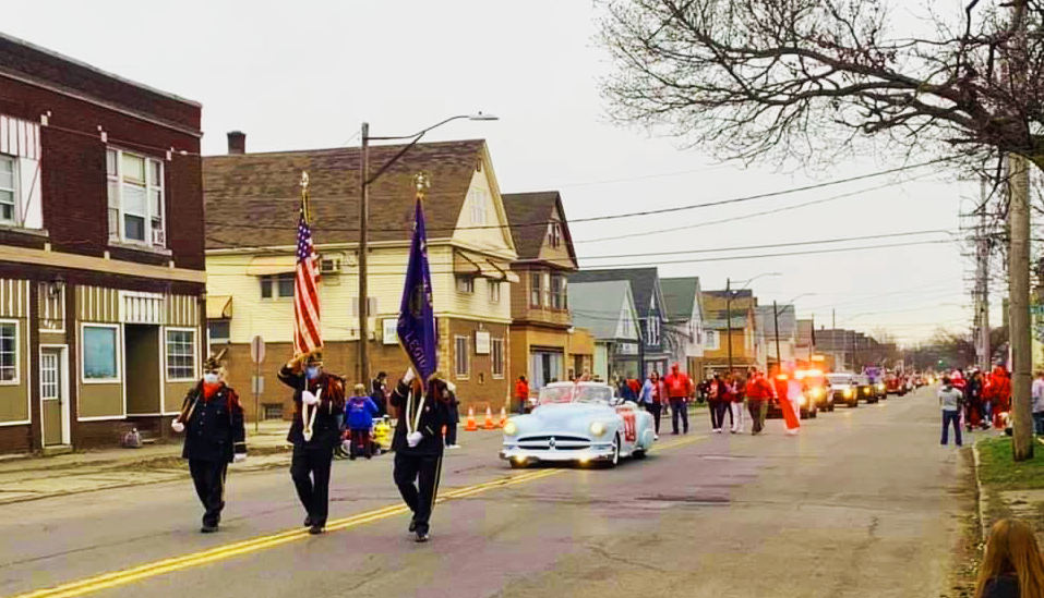 The Sikora Post Color Guard leads the Dyngus Day Parade down Oliver Street in 2021. (Submitted photo)