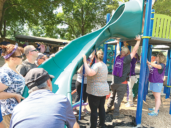 Photos depicting The Mayor's Park Playground on and after build day, Saturday, July 27.