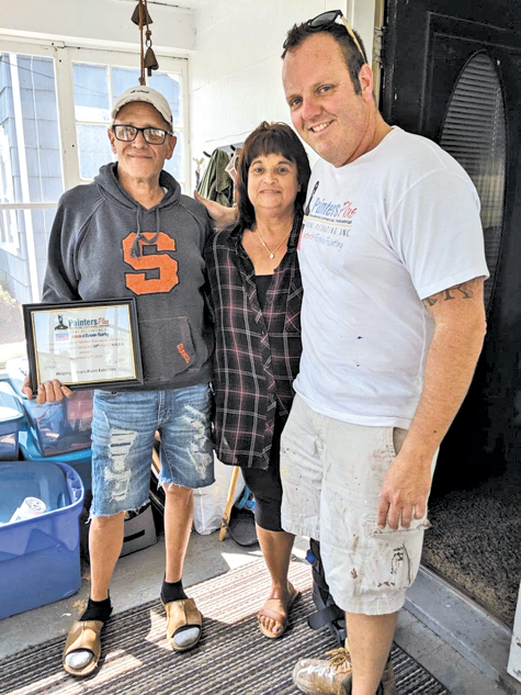 From left: Steven and Cindy Kureczka with Jesse Gooch, owner of Painters Plus. (Submitted)