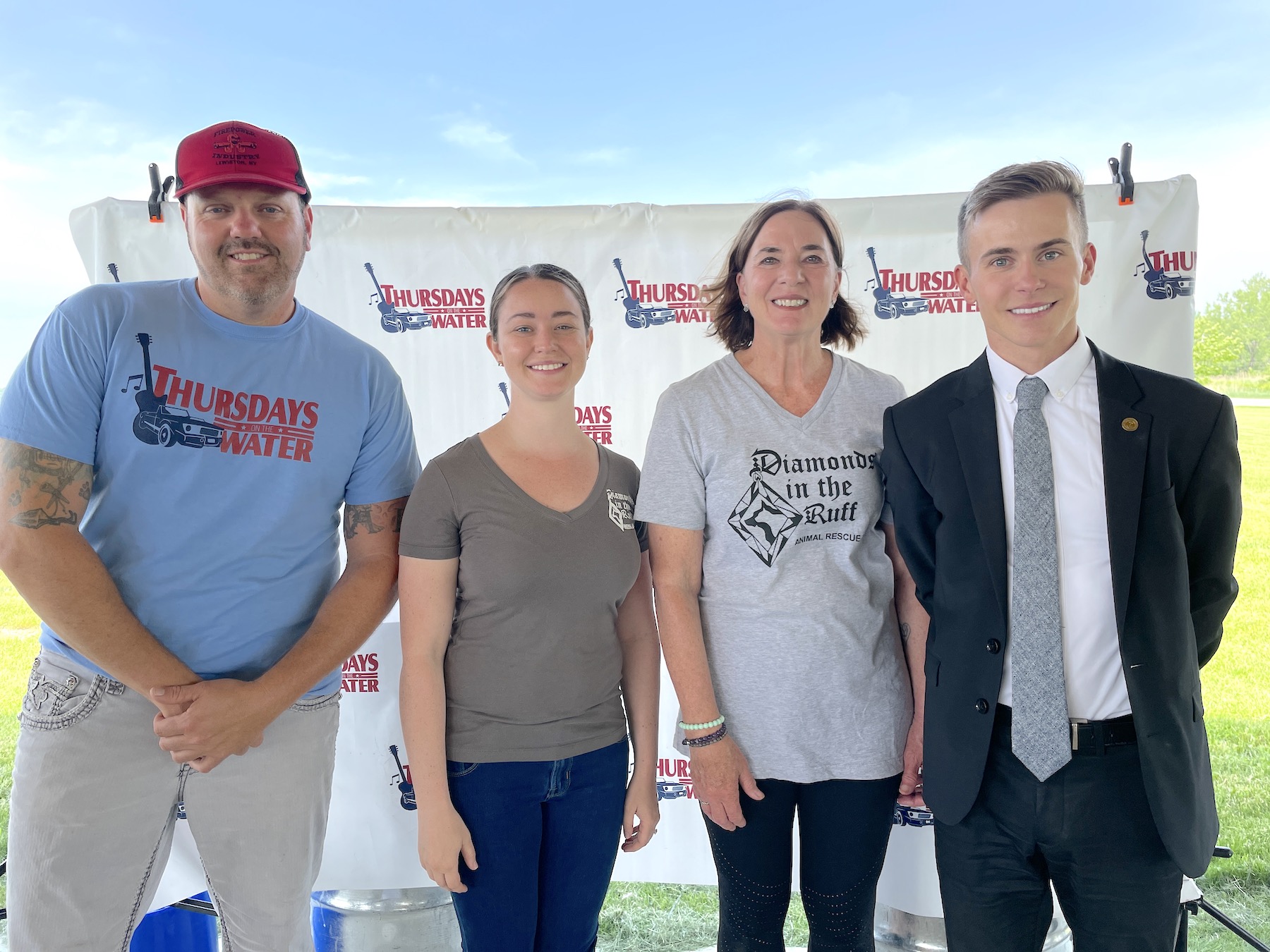 Pictured at the `Thursdays on the Water` press conference are, from left, Jesse Gooch; Leandra Herzog and Tammy Heim of Diamonds in the Ruff Animal Rescue; and City of North Tonawanda Mayor Austin Tylec.