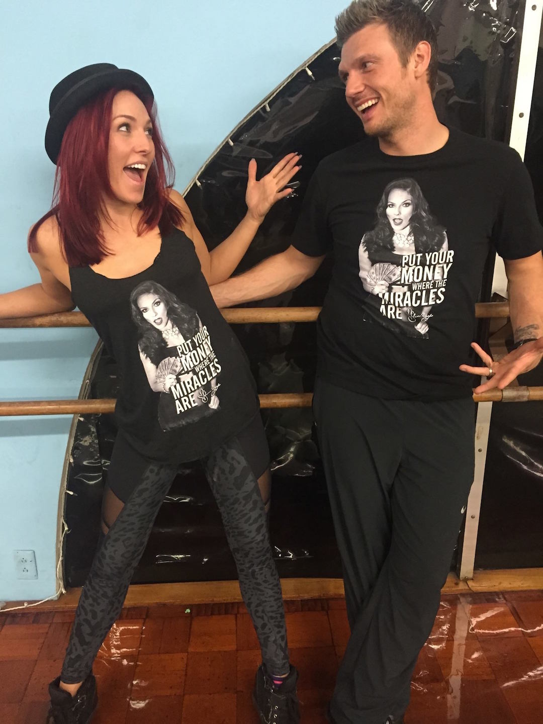 ​Sharna Burgess and Nick Carter from ABC's "Dancing with the Stars" wear her new T-shirt. (Photo submitted by MLC PR)