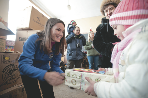 Livia Satterfield visits children at a Romanian orphanage as part of Operation Christmas Child. She will share her story Saturday and Sunday at local organizations.