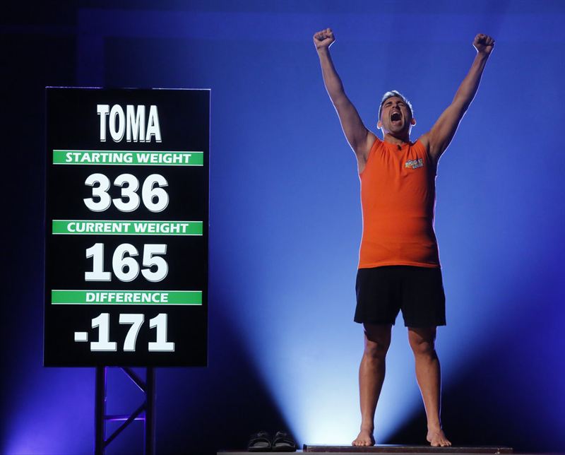 Toma Dobrosavljevic stands in victory on `The Biggest Loser.` (NBC photo by Vivian Zink)
