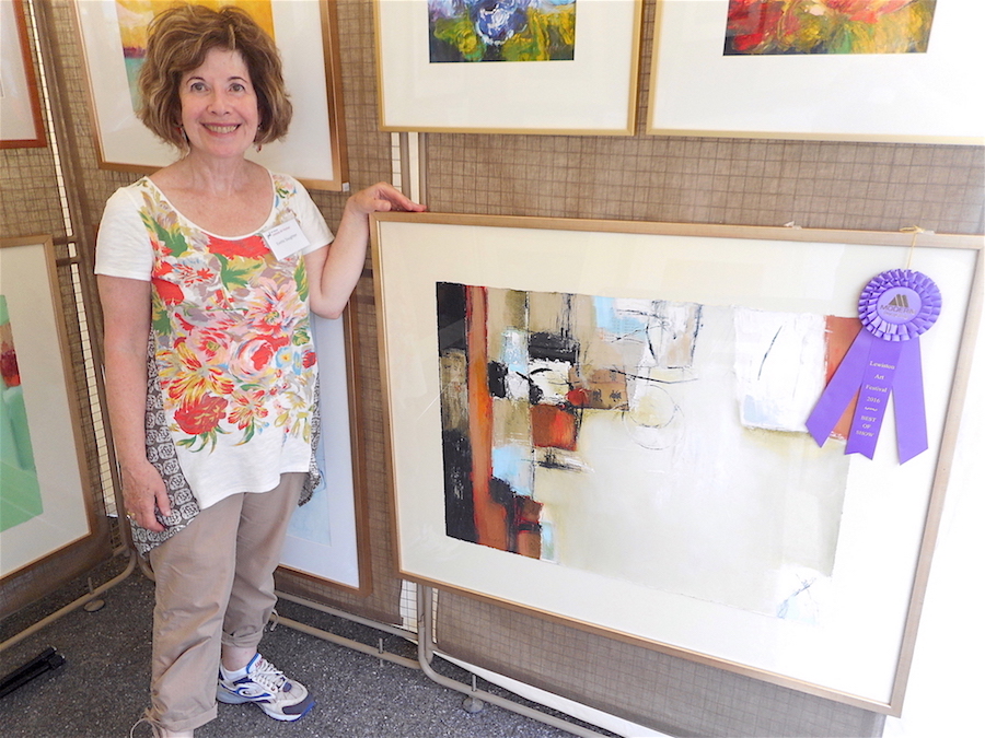 Pictured: Evette Slaughter with her Best of Show piece, `Chinatown` (oil).