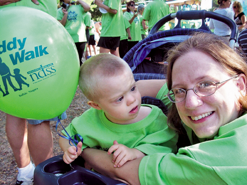 Jill Keppeler is shown with her then-2-year-old son, James, at the 2007 Buddy Walk at the Lewiston Kiwanis Peach Festival parade. This year's Buddy Walk will take place Sept. 12 at the parade.