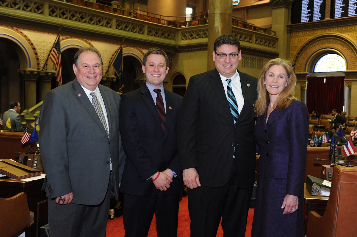 Pictured, from left: Assemblyman John Ceretto; Alex Wilson, associate council for the New York State Sheriff's Association; Niagara County Sheriff James Voutour; and Assemblywoman Jane Corwin in the Assembly chamber.