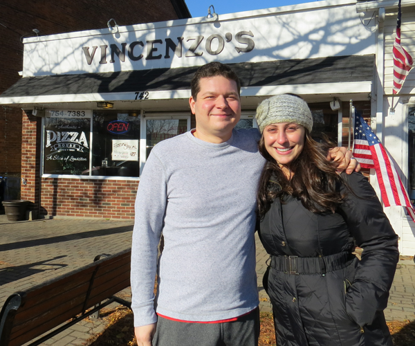 David and Sarina Munzi stand outside Vincenzo's Pizza House in Lewiston.