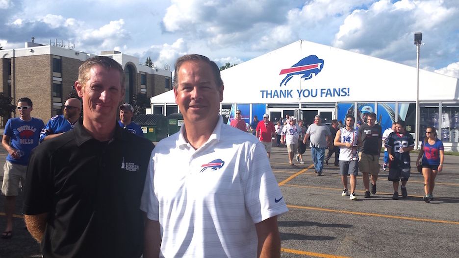 Steve Salluzzo, St. John Fisher director of auxiliary services, left, and Andy Major, Bills vice president of operations and guest services.