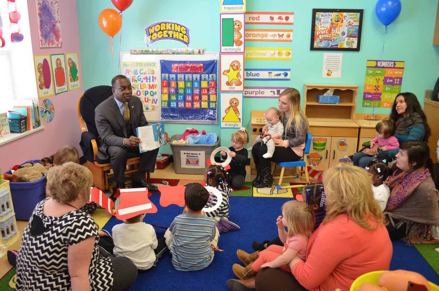 City of Buffalo Mayor Byron Brown reads to children at Cornerstone Manor as part of the organization's new Read 2 Dream program.