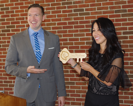 Town Supervisor Nathan McMurray presents Kim Pegula with a key to Grand Island Wednesday during a press conference announcing the One Buffalo Cupcake. Town Supervisor Nathan McMurray presents Kim Pegula with a key to Grand Island Wednesday during a press conference announcing the One Buffalo Cupcake.