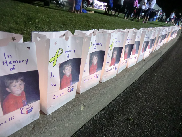 Luminaria honoring both those who survived cancer and those who succumbed to it were lit and ringed the walkway at the Relay For Life. (Photo by Larry Austin)