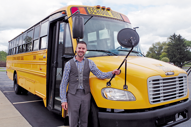 St. Stephen School Principal Scott Gruenauer and the St. Stephen R.C. Church parish will introduce their first school bus for the school at a ceremony today. (Photo by Larry Austin)