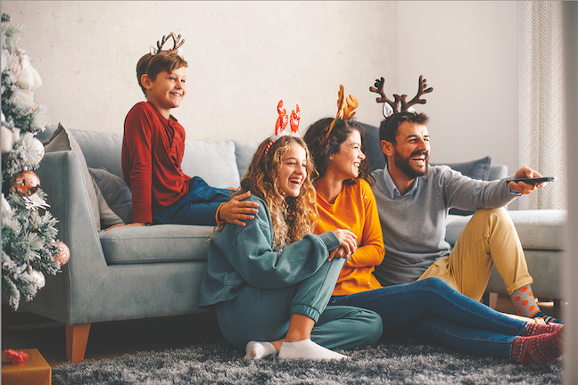 When hosting overnight guests this holiday season, hosts can plan a family movie night and line up any of these family-friendly holiday movies. (Metro Creative Graphics)