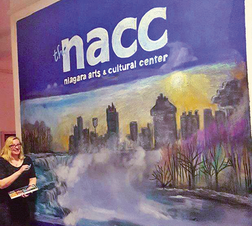 Artist Caedyn Metz works on her mural to be on display for the upcoming `Beyond the Barrel Art Exhibition.` (Photo provided by the Niagara Arts and Cultural Center)
