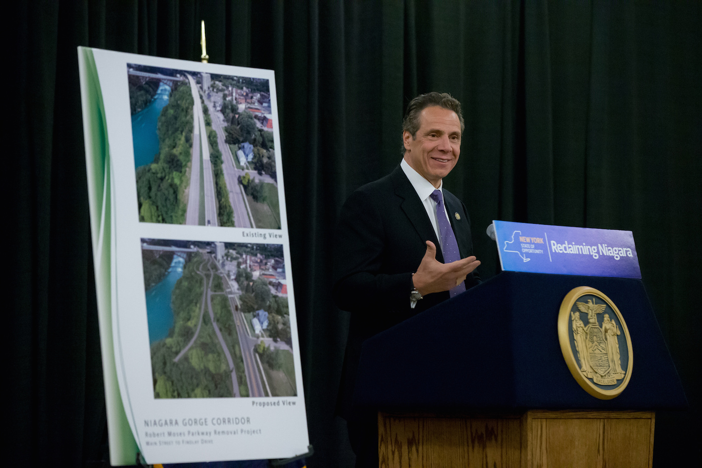 Gov. Andrew M. Cuomo made an announcement that included improved access to the waterfront, at the Niagara Falls Conference & Event Center. He is shown below shaking hands with Lewiston's Jerry Mosey. 