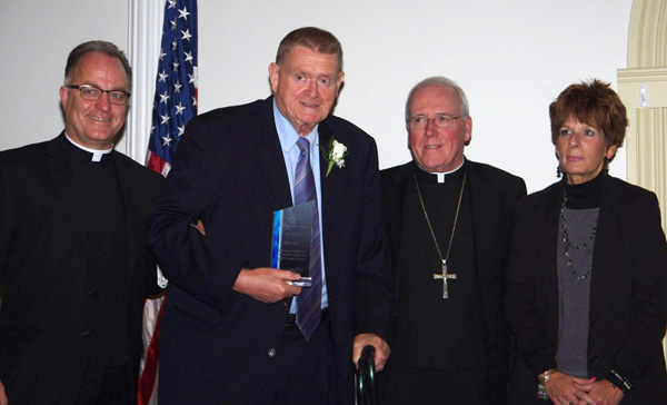 Jim Allen, second from left, is awarded.