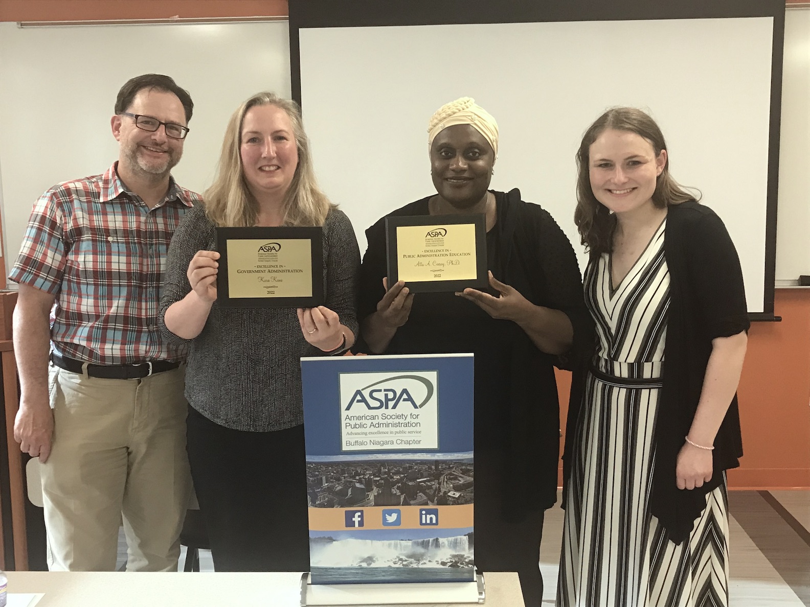 Pictured, from left: Chris Marcello, MPA; Kara Kane, MA; Atta A. Ceesay, Ph.D.; and Makenzie Docteur, MPA. (Submitted photos)
