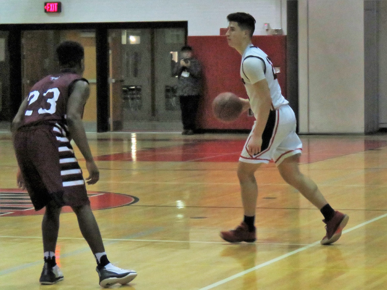 Niagara-Wheatfield guard Anthony Ruffino is guarded by Maryvale's Rashad Law during Monday night's non-league contest. (Photo by David Yarger)
