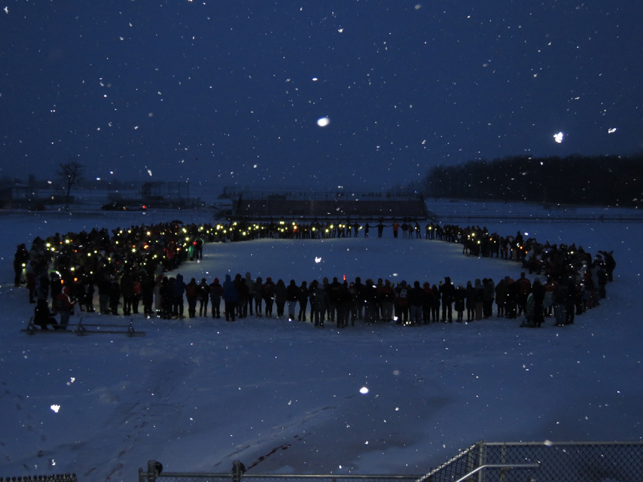 Amidst the blowing snow and bitter temperatures, the community came out to honor the life of Michael Ziegler. (Photo by David Yarger) 