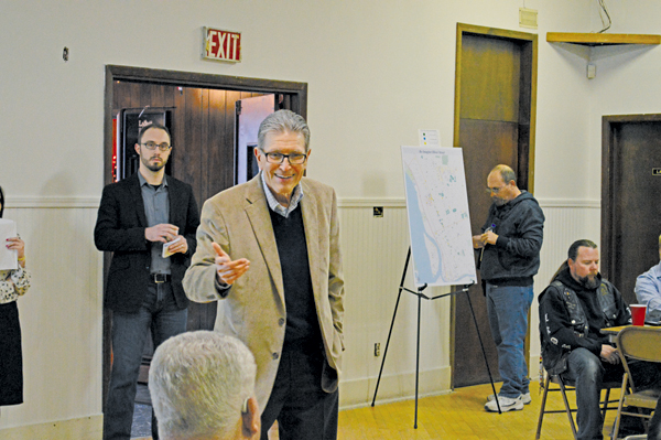 Lumber City Development Corp. consultant Harry Sicherman addresses an open meeting about revitalization of Oliver Street.