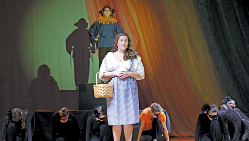 Katie Riederer is Dorothy and Abigail Fay is the scarecrow in the Connor Middle School production of `The Wizard of Oz.` (photo by Larry Austin)