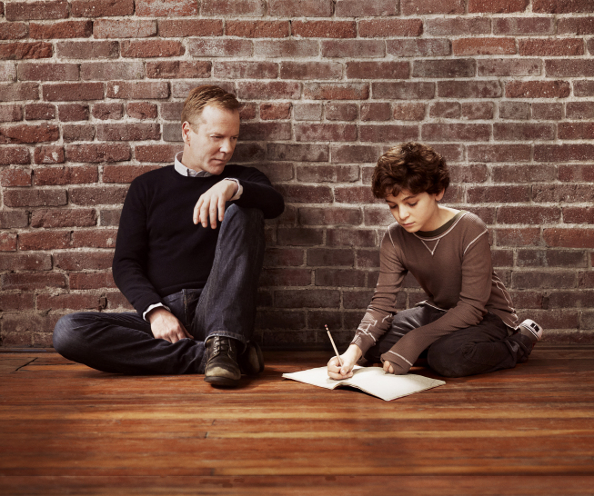Kiefer Sutherland, right, returns to FOX as Martin Bohm, a widower and single father, haunted by an inability to connect to his 11-year-old son (David Mazouz). But everything changes when he discovers that his son possesses the gift of staggering genius - the ability to see things that no one else can and the patterns that connect seemingly unrelated events. `Touch` debuts with a special preview Wednesday, Jan. 25, on FOX. (photo ©2012 Fox Broadcasting Co./Credit: Brian Bowen Smith/FOX) 