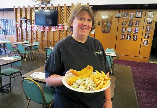 Linda Brown is shown with her winning fish fry.