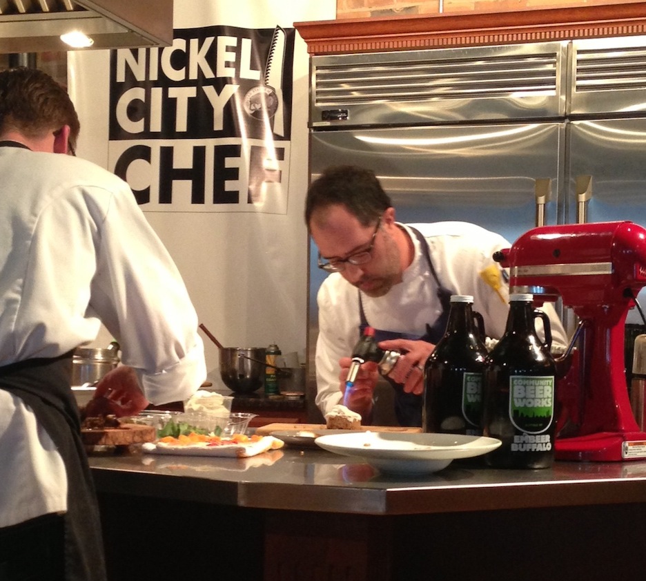 Chef Carmelo Raimondi prepares one of the dishes he entered as part of the `Nickel City Chef` competition. (photo by Vincent Rossi) 