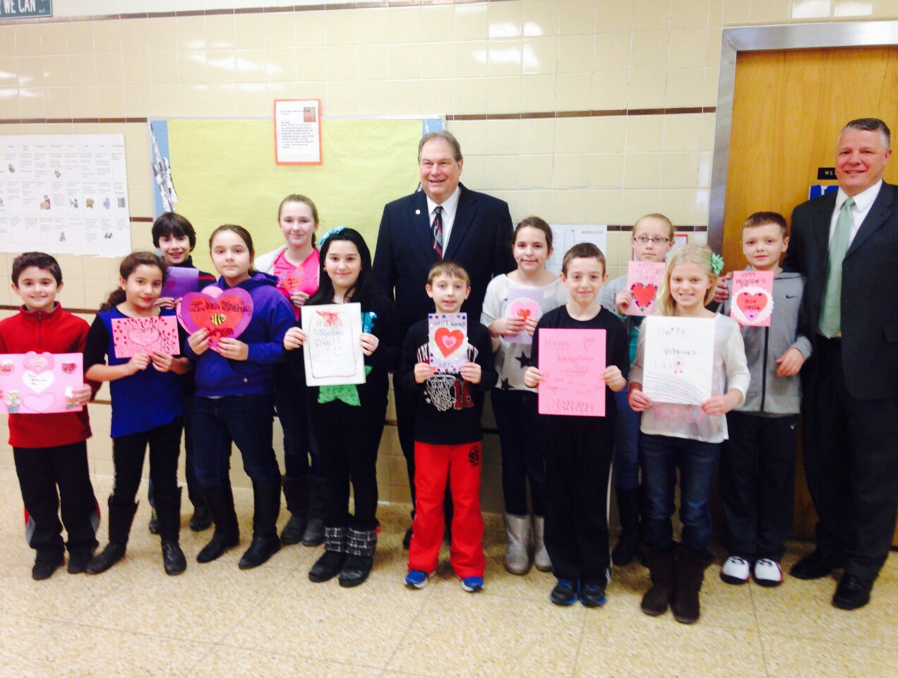 Assemblyman John Ceretto is pictured with students from Lewiston-Porter Intermediate School who made valentines for seniors.