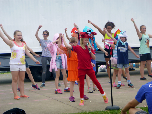 Alanna Banas, 9, of North Tonawanda, who plays Sebastian, leads a dance at a recent rehearsal of In Good Company Production's `Disney's The Little Mermaid Jr.` The show will open July 27.