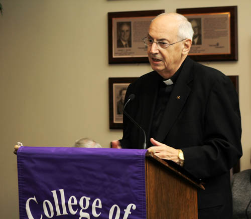The Rev. Joseph L. Levesque, C.M., addresses the audience during a press conference to update the progress of the Niagara County Early Child Care Quality Improvement Project. (photo by Mike Freedman)